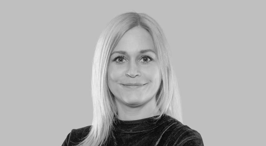 Anja Hasse lächelt in die Kamera.